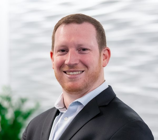 Headshot of Cory Donovan