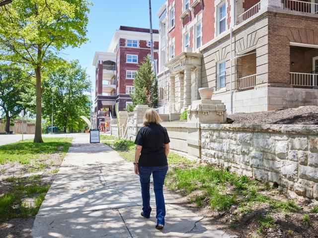Woman taking a stroll around a multifamily property
